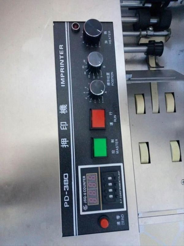 MY-380 एम्बॉसिंग और सॉलिड इंक बैच कोड प्रिंटिंग मशीन लेबल पेपर प्रिंटिंग मशीन