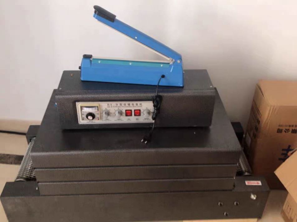 बोतल/बॉक्स के लिए हॉट सेल स्मॉल प्लास्टिक फिल्म हीट टनल श्रिंक कटिंग पैकेजिंग मशीन, आसान संचालन