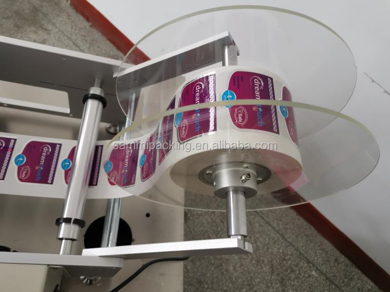 अर्ध-स्वचालित लेबलिंग मशीन दो तरफा गोल बोतल चिपकने वाला स्टिकर लेबलर प्लास्टिक कांच के जार दो तरफा लेबलिंग मशीन