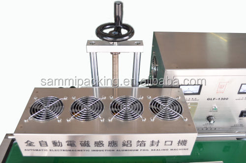 डेस्कटॉप निरंतर विद्युत चुम्बकीय प्रेरण सीलर एल्यूमीनियम पन्नी सीलिंग मशीन पैकिंग मशीनें 50 मिमी से 120 मिमी