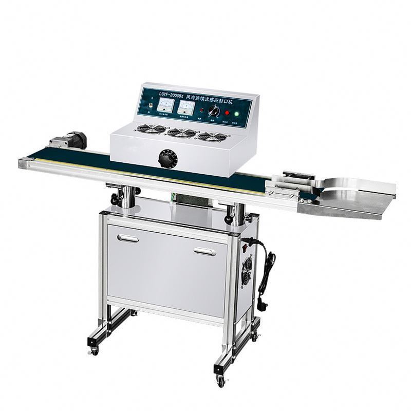 थोक स्वचालित ग्लास जार इंडक्शन बोतल सीलिंग मशीन फ्लोर टाइप स्वचालित इंडक्शन सीलिंग मशीन